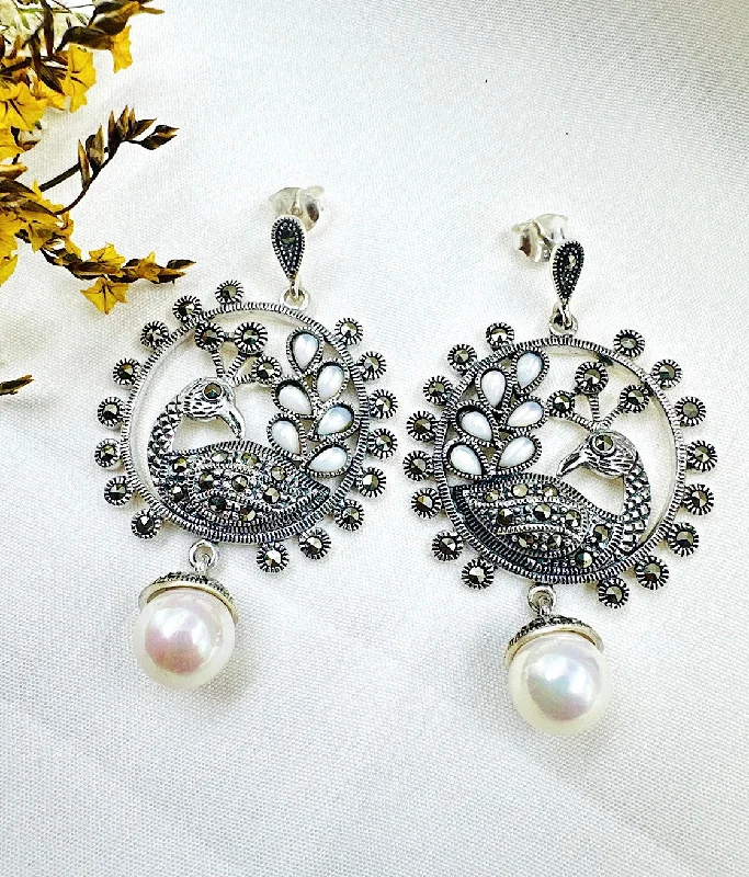 ladies-luxury-diamond-earrings-The Peacock Silver Pearl Marcasite Earrings