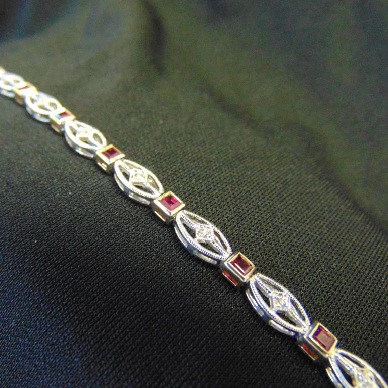 Ladies bracelets with rain charms -14KT White And Yellow Gold Ruby & Diamond Bracelet