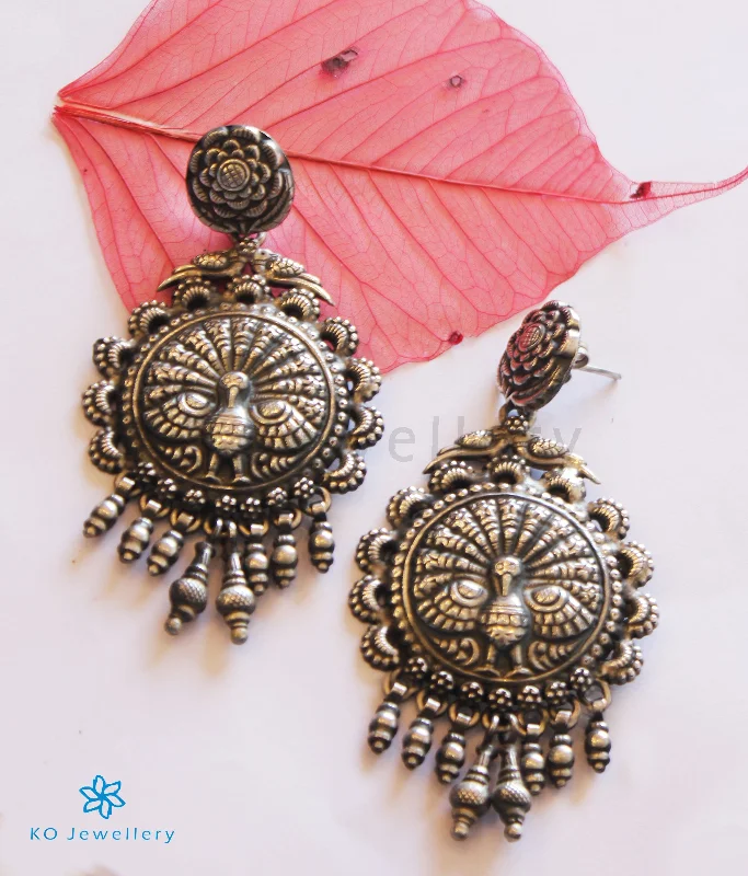 ladies-elegant-gold-earrings-The Mudra Silver Peacock Earrings