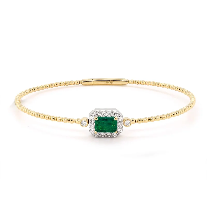 Ladies bracelets for memorable moments -YELLOW GOLD BANGLE BRACELET WITH AN EMERALD AND DIAMOND HALO, .36 CT TW