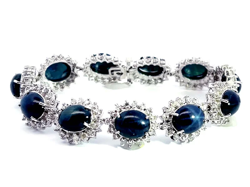 Ladies bracelets sleek cuffs -Blue Star Sapphire Diamond Statement Bracelet in 14k White Gold