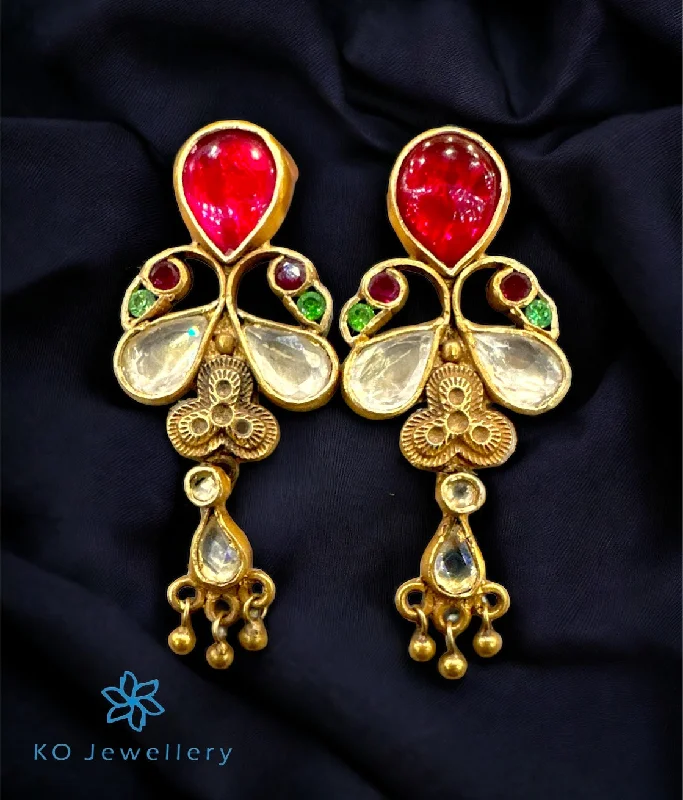 ladies-trendy-rose-gold-earrings-The Aaria Peacock Silver Kundan Earrings